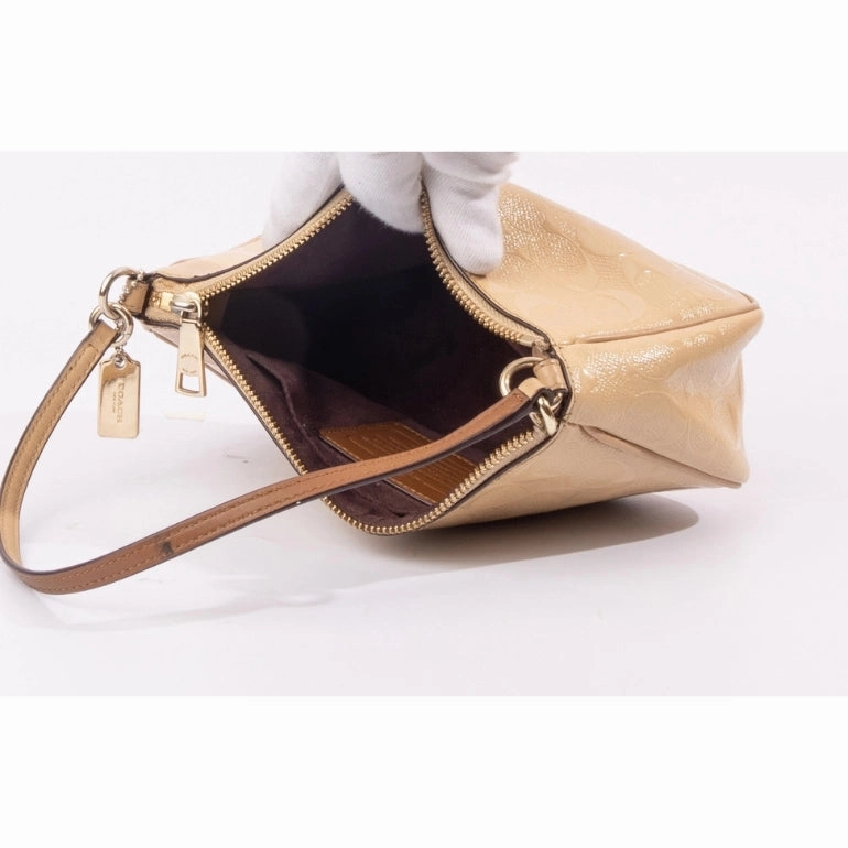 Coach Top Handle Pouch In Signature Debossed Patent Leather