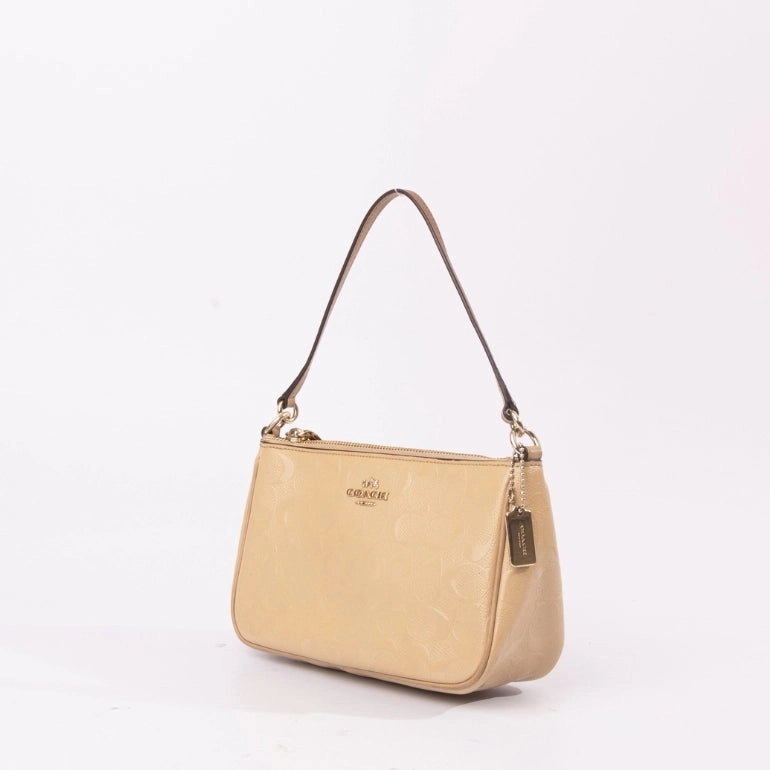 Coach Top Handle Pouch In Signature Debossed Patent Leather
