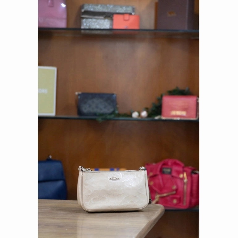 Coach Top Handle Pouch In Signature Debossed Patent Leather