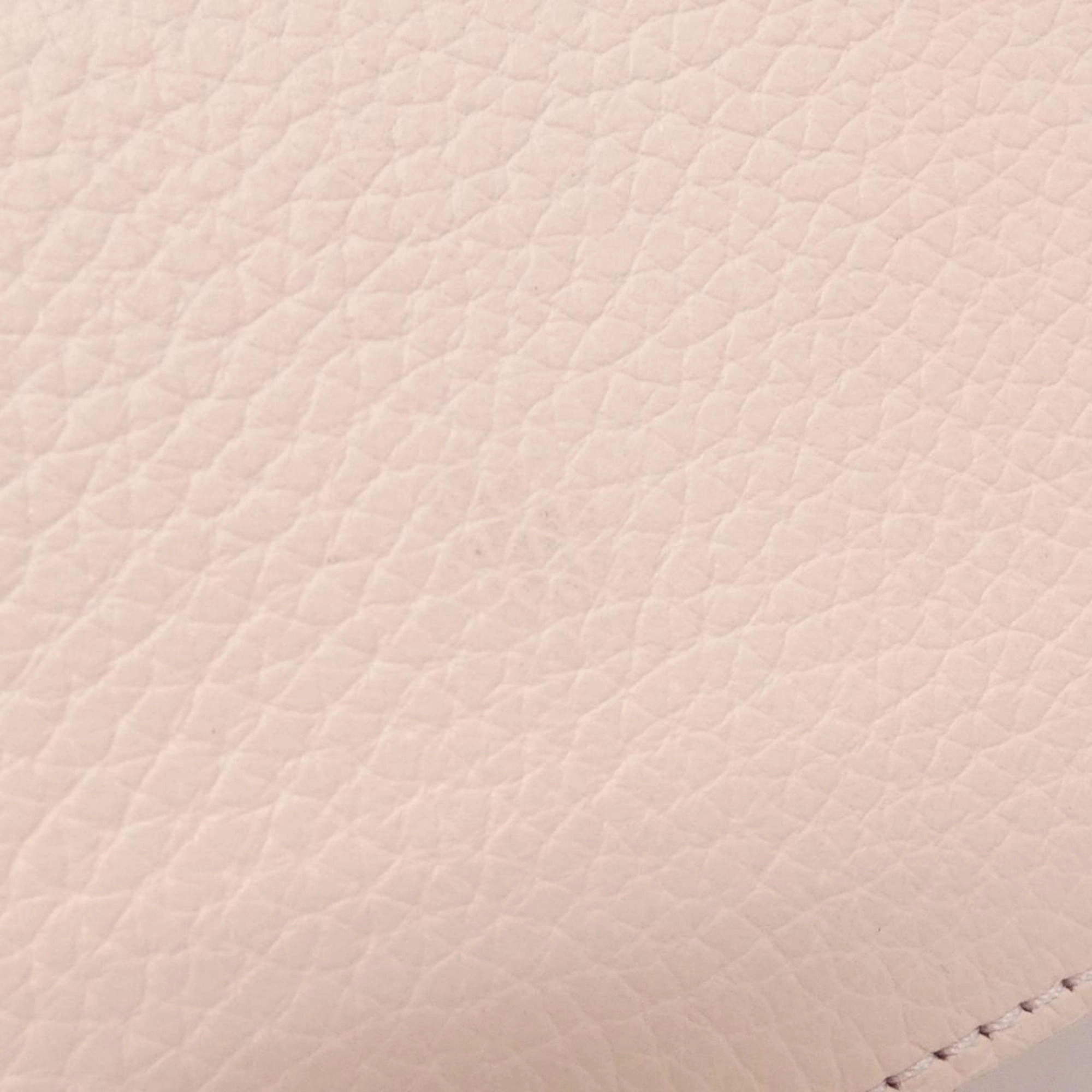 Elegant Capucines Leather Handbag with Dust Bag and Shoulder Strap