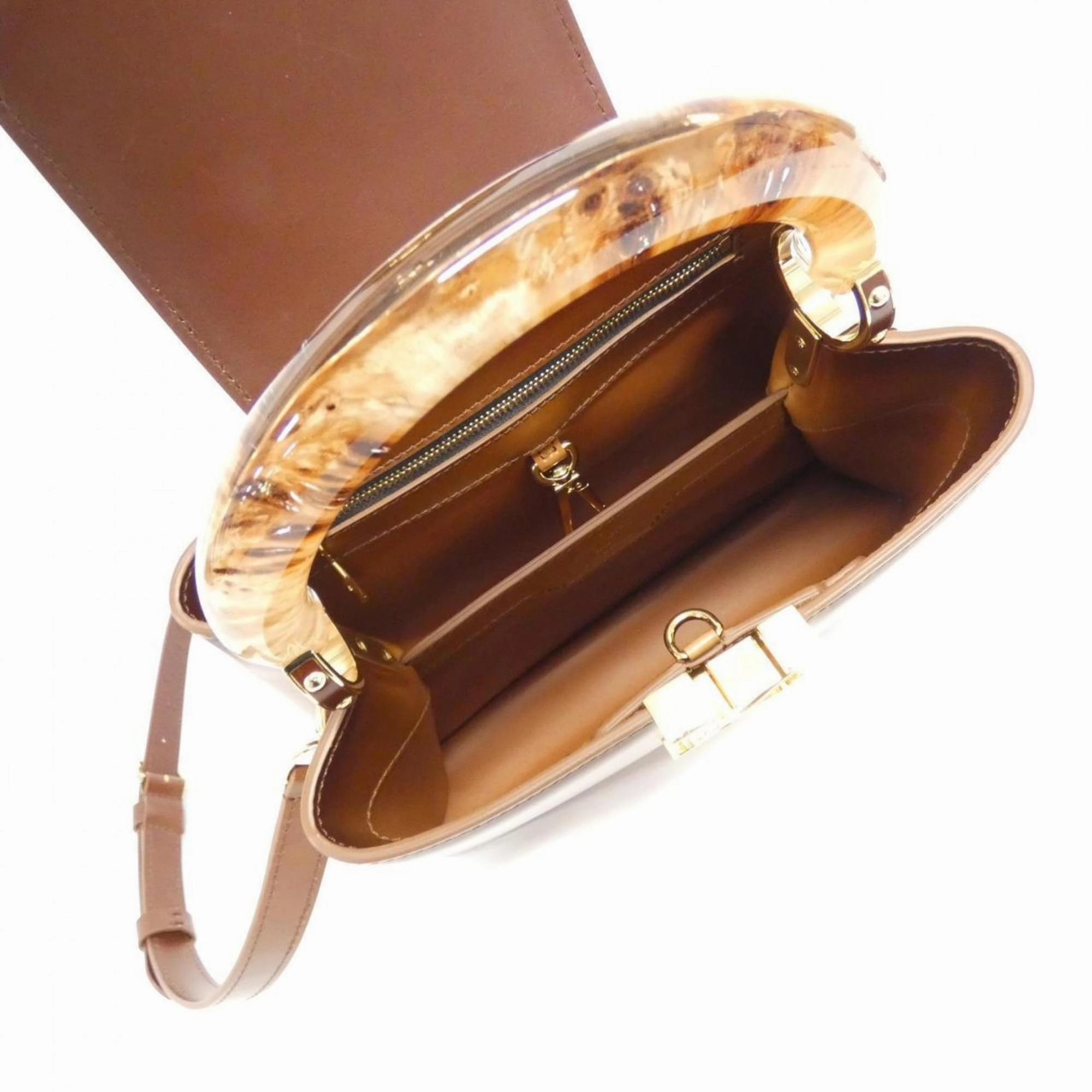 Elegant Leather Handbag with Dust Bag and Shoulder Strap