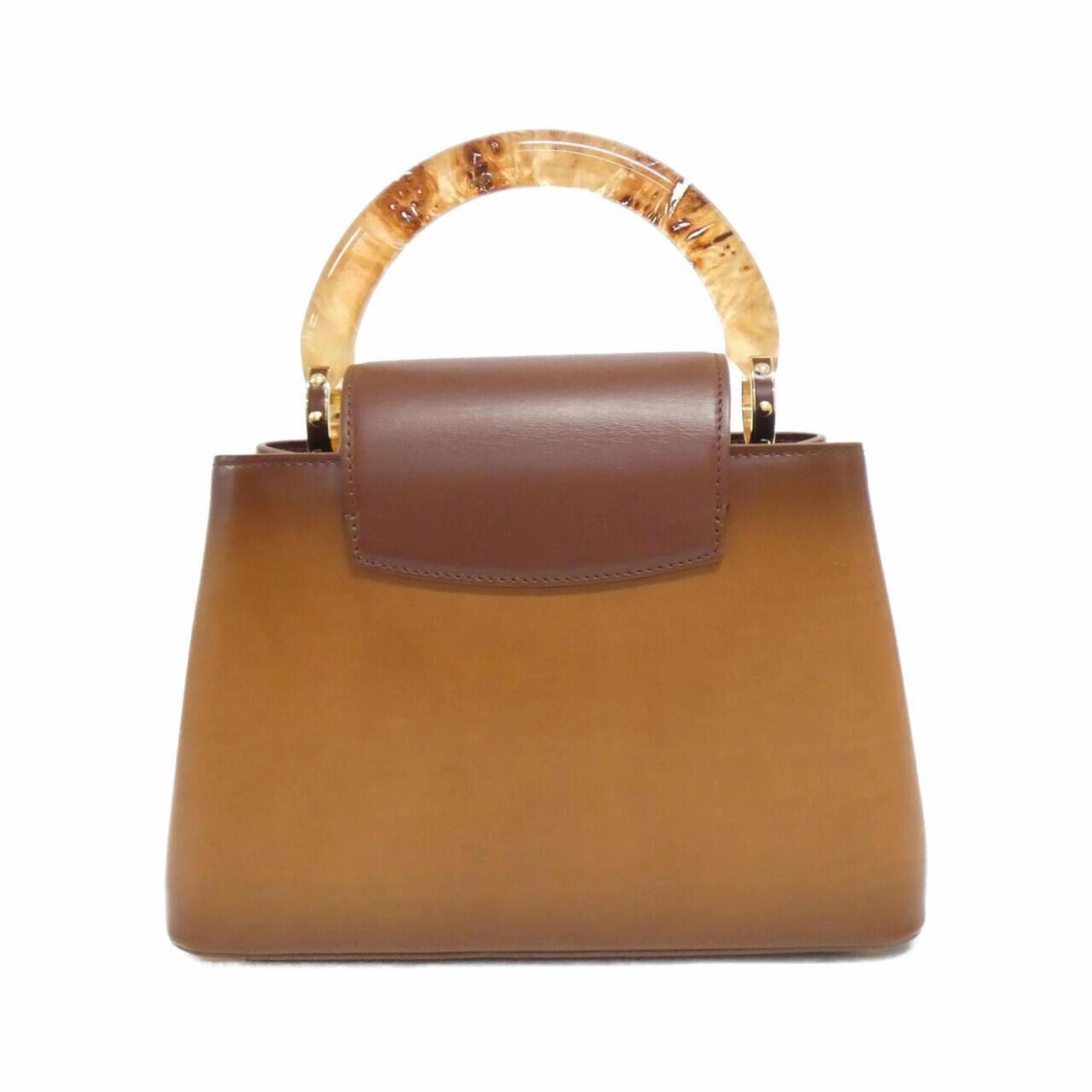 Elegant Leather Handbag with Dust Bag and Shoulder Strap