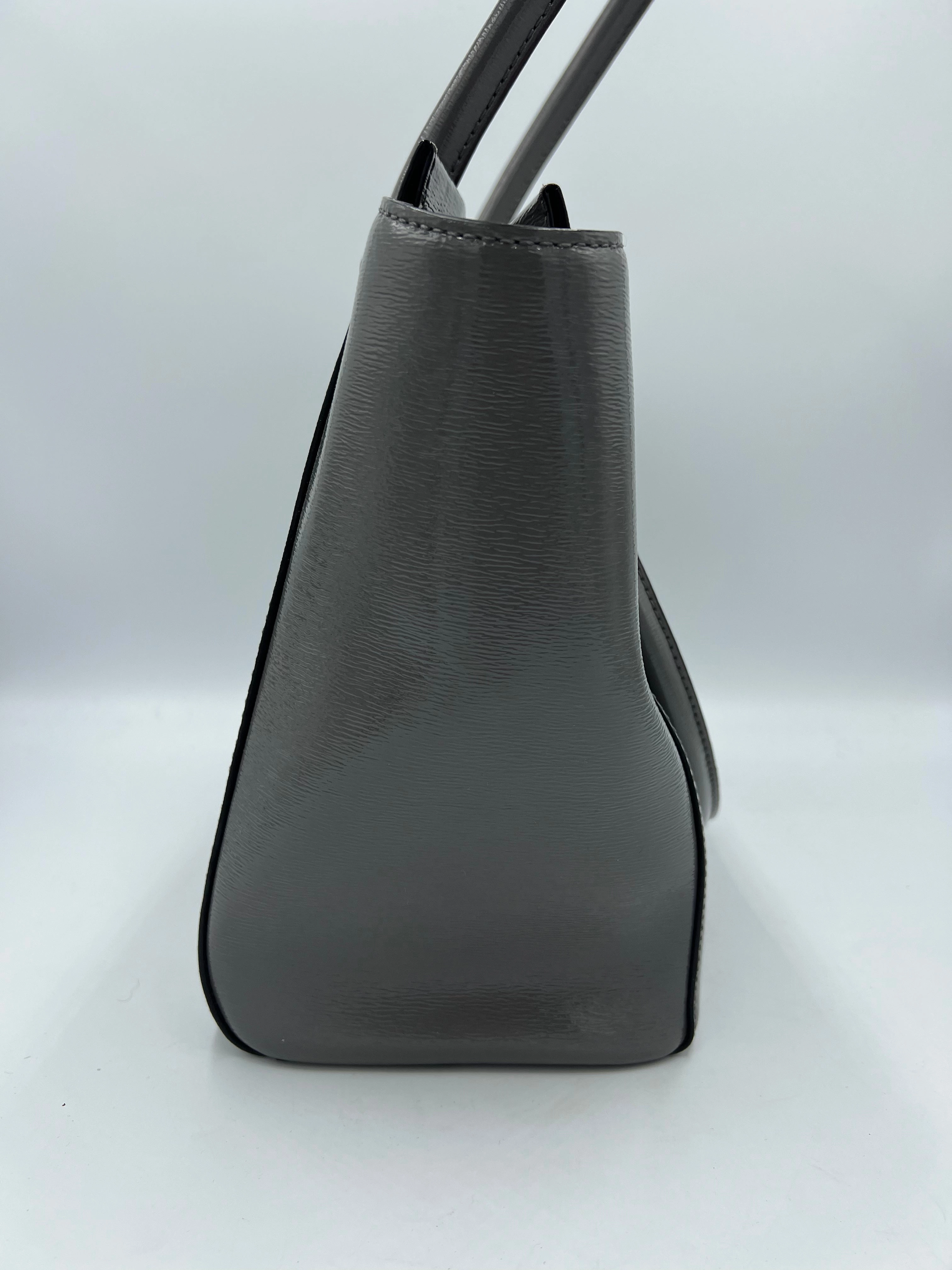 Handbag Designer By Kate Spade