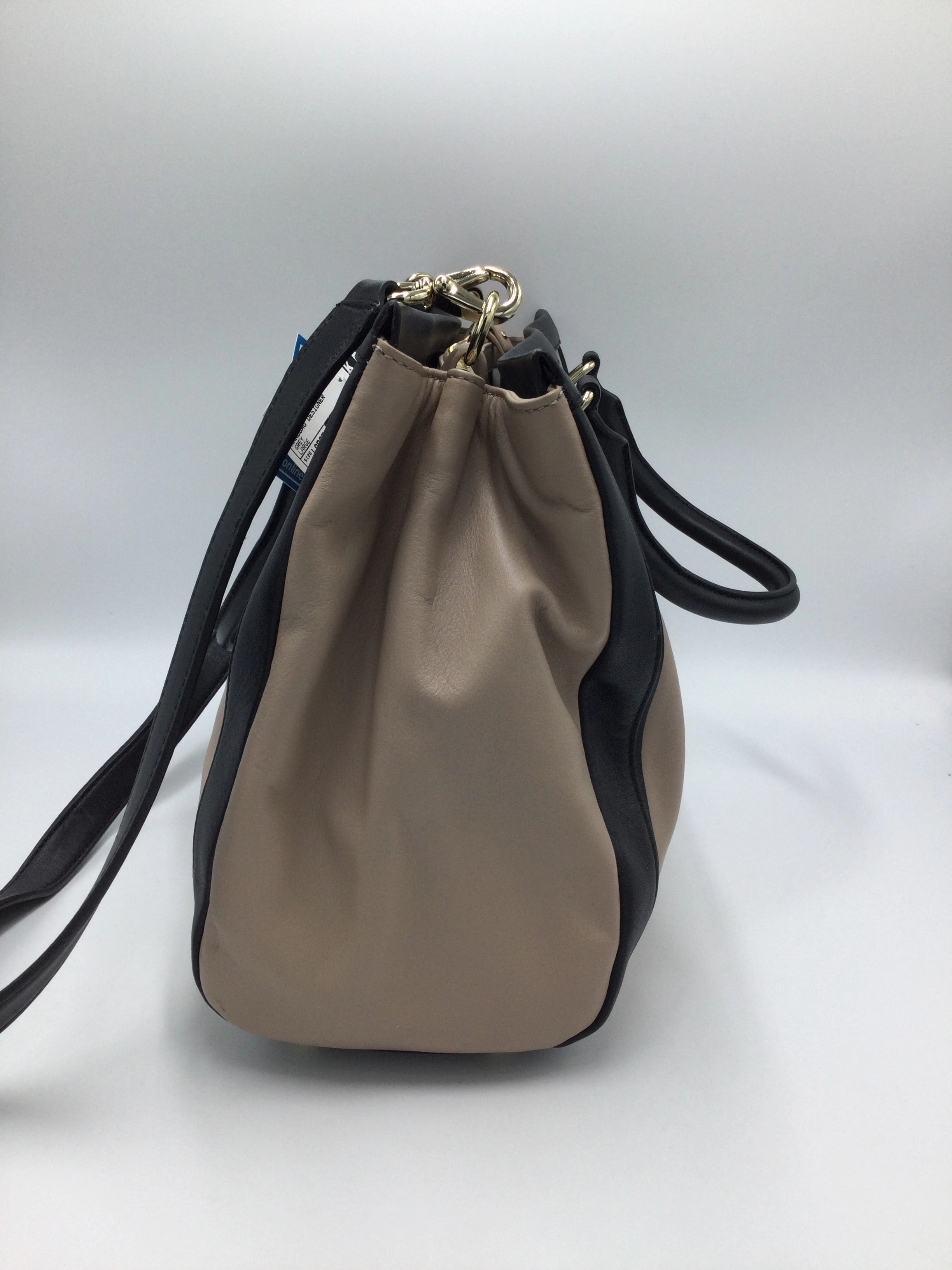 Handbag Designer By Kate Spade