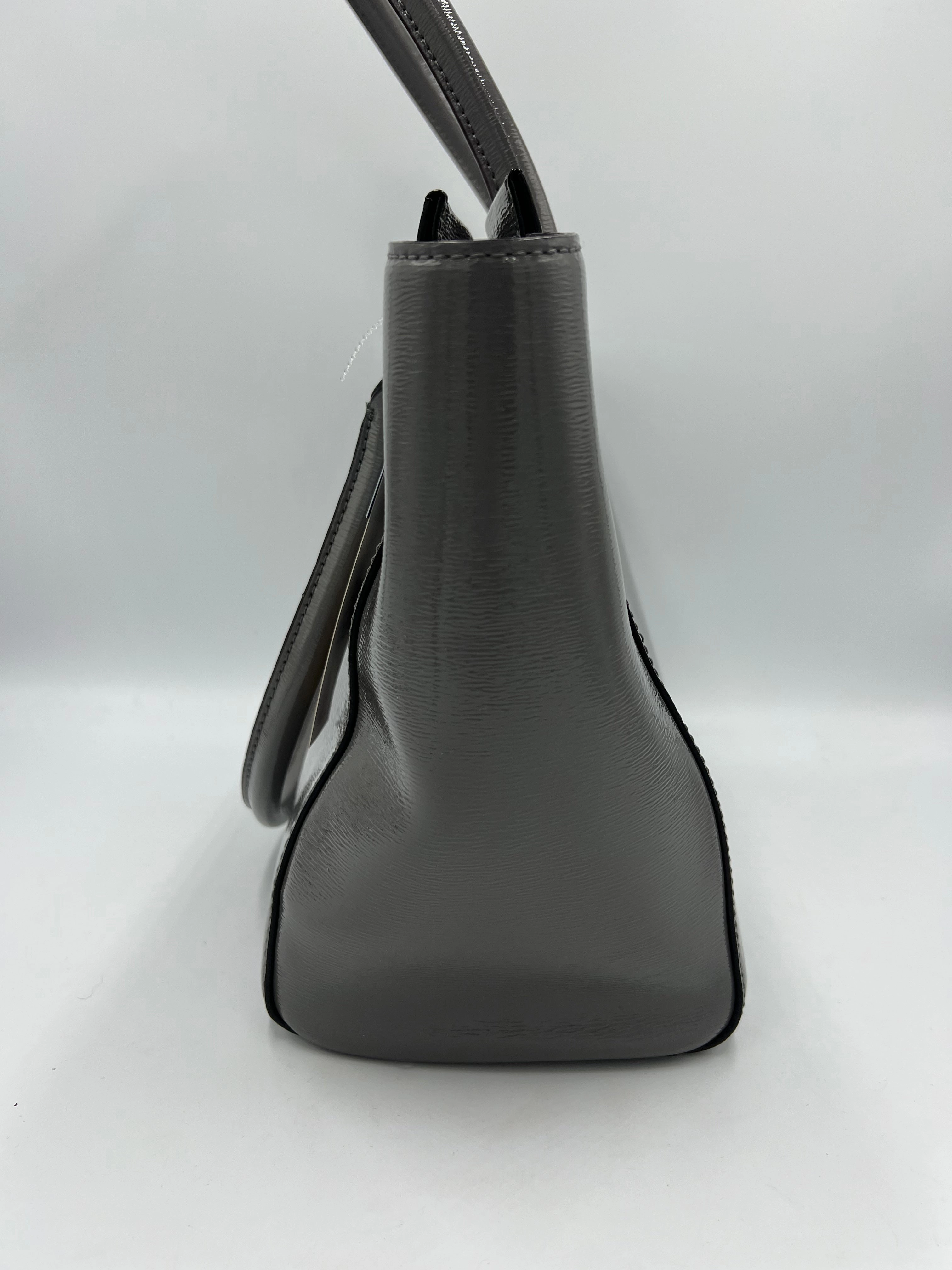 Handbag Designer By Kate Spade