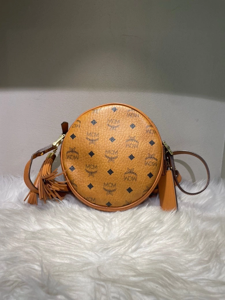 MCM Pre-Loved Visetos Leather Round Crossbody Bag in Cognac
