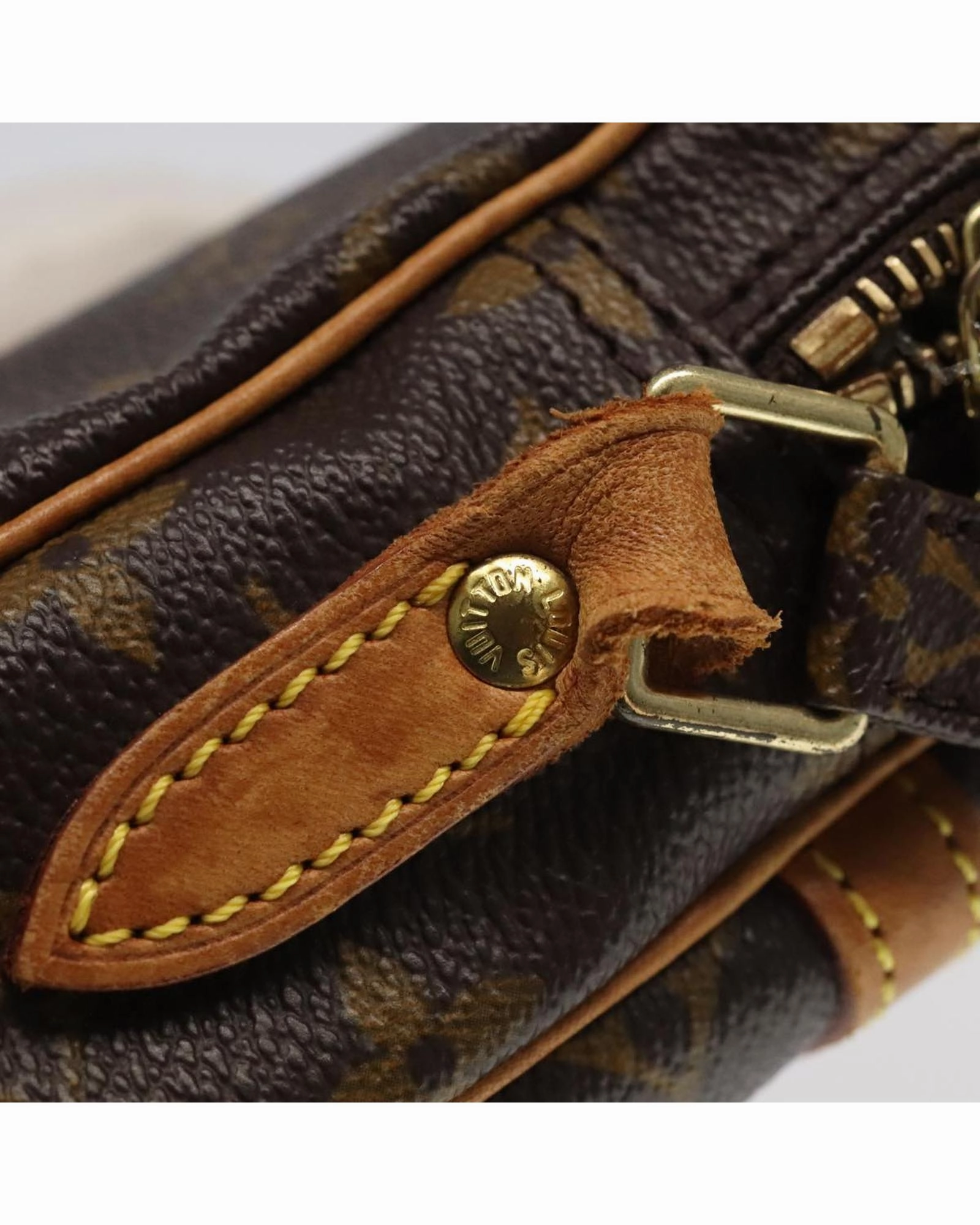 Monogram Canvas Shoulder Bag with Adjustable Strap and Vintage Detailing