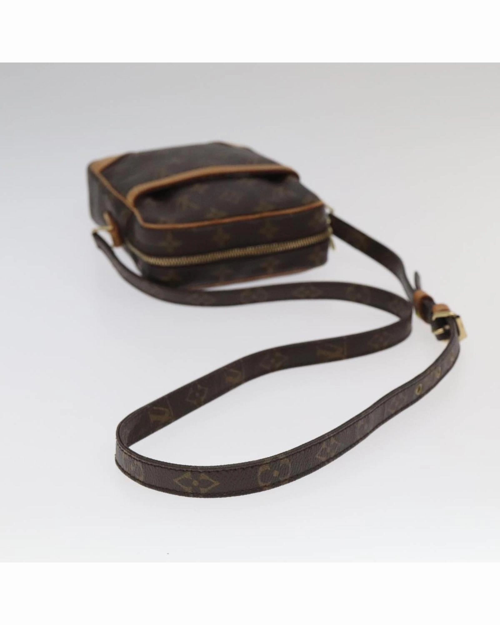 Monogram Canvas Shoulder Bag with Adjustable Strap and Vintage Detailing