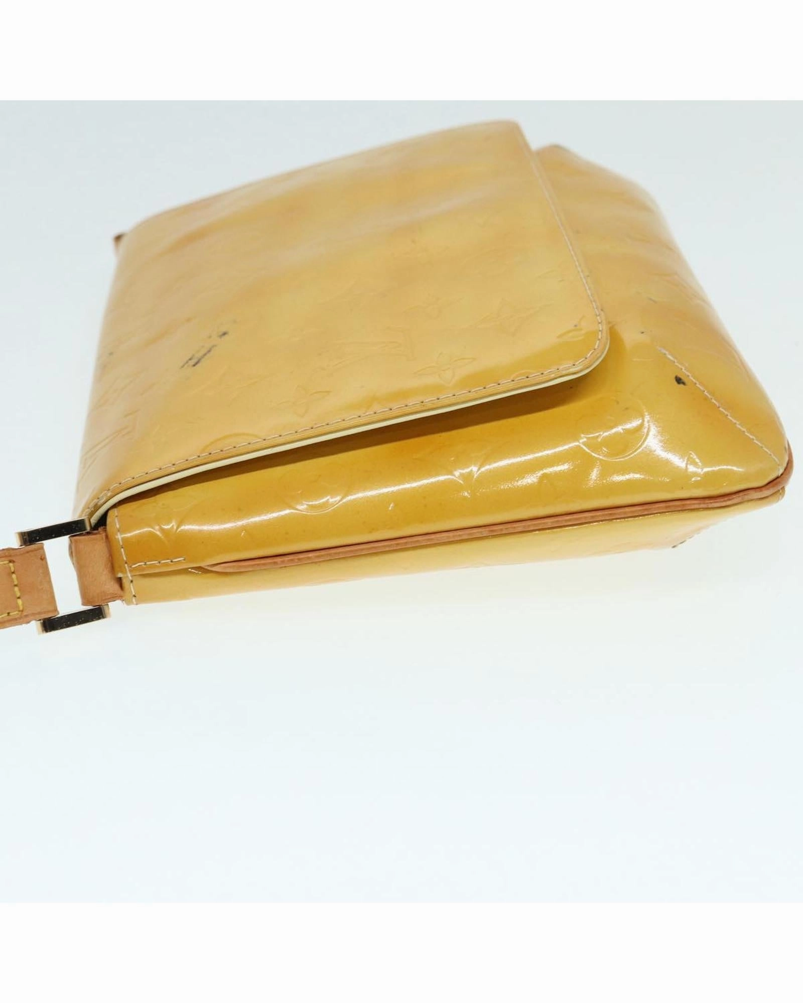 Pochette M90076 crossbody bag